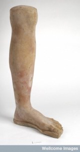 L0035894 A clay-backed leg and foot. Roman votive offering