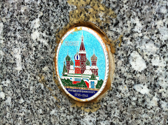 Ceramic medallion with image of Saint Basil’s Cathedral in Red Square, Moscow.